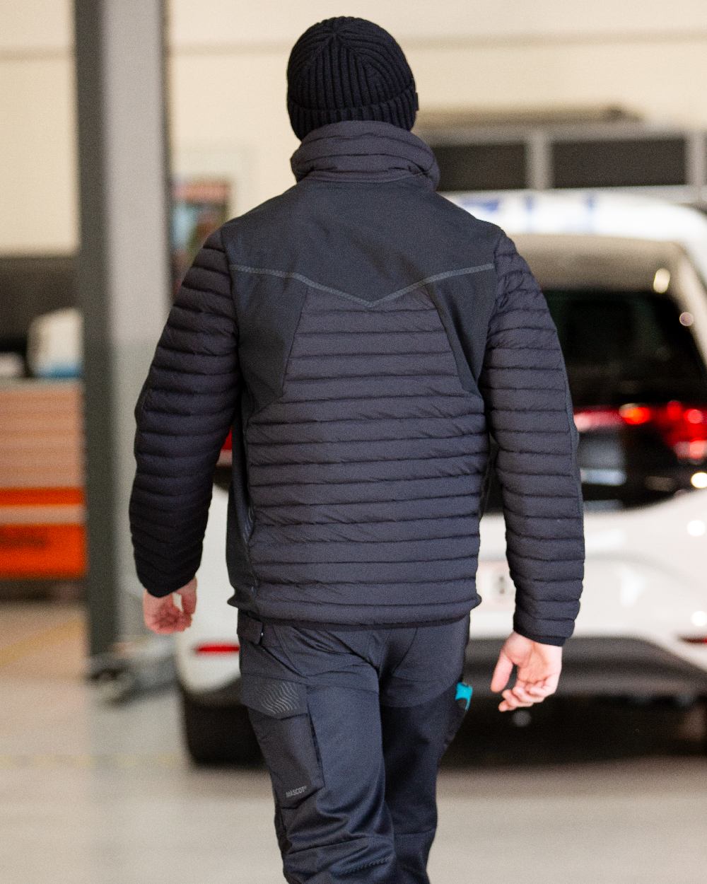 Black Coloured Mascot Workwear Mens Customized Lightweight Breathable Jacket on garage background