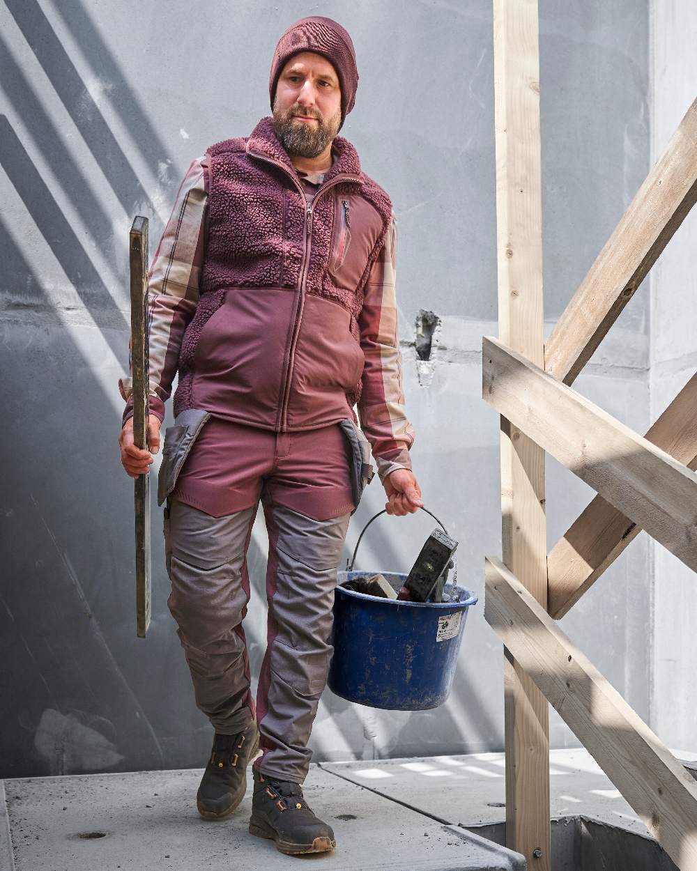 Bordeaux Stone Grey Coloured Mascot Workwear Mens Customized Ultimate Stretch Trousers With Kneepad Pockets on construction background