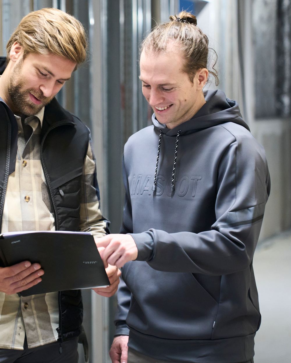 Black Coloured Mascot Workwear Mens Customized Water Repellent Fleece Hoodie on construction background