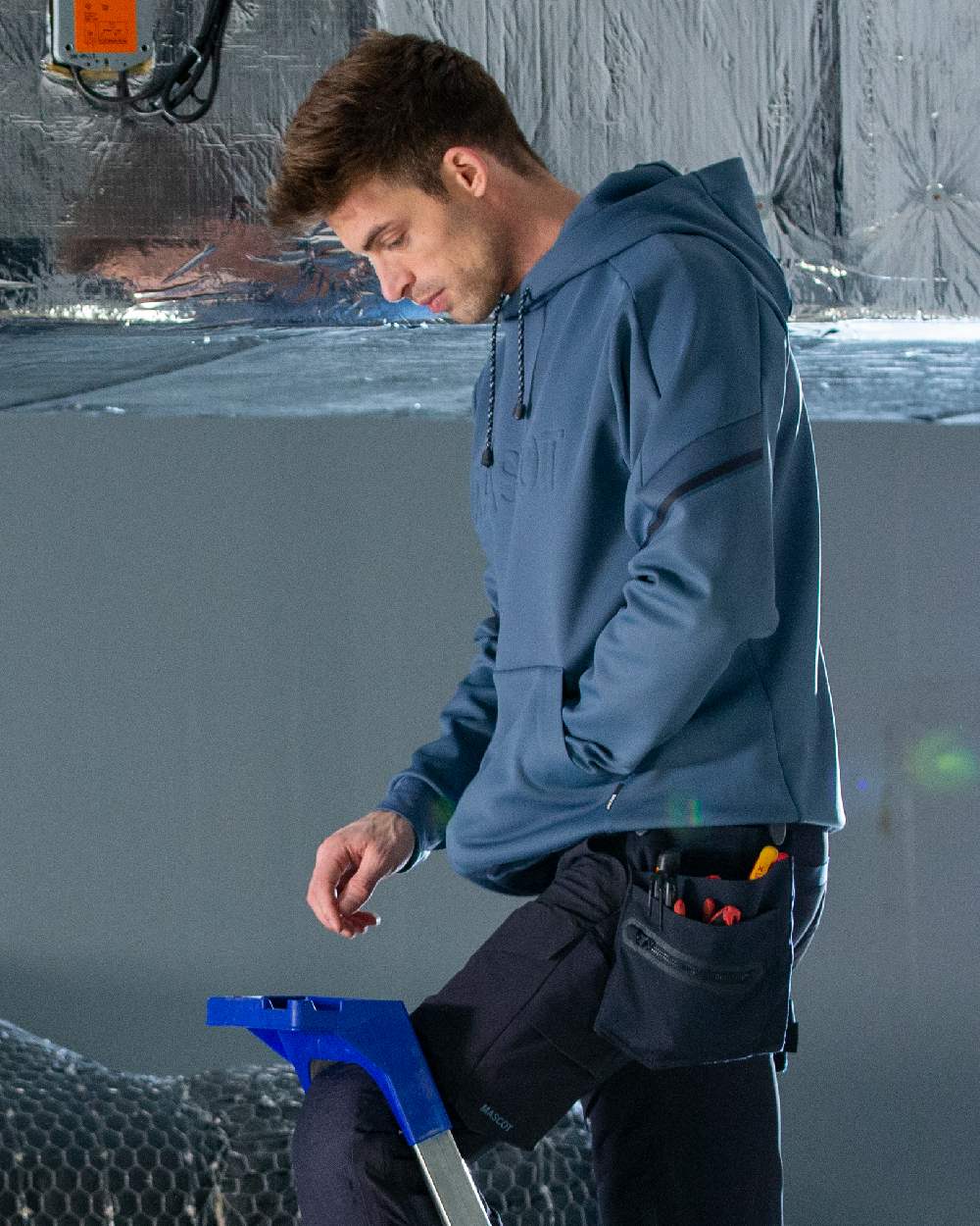 Stone Blue Coloured Mascot Workwear Mens Customized Water Repellent Fleece Hoodie on construction background