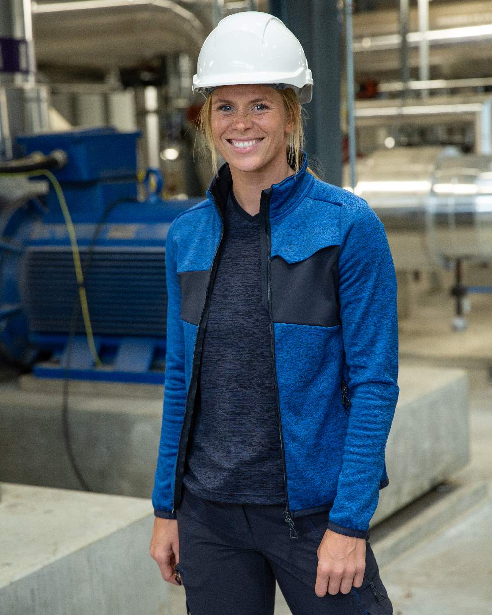 Azure Blue Dark Navy Coloured Mascot Workwear Womens Accelerate Fleece Jumper With Zipper on factory background