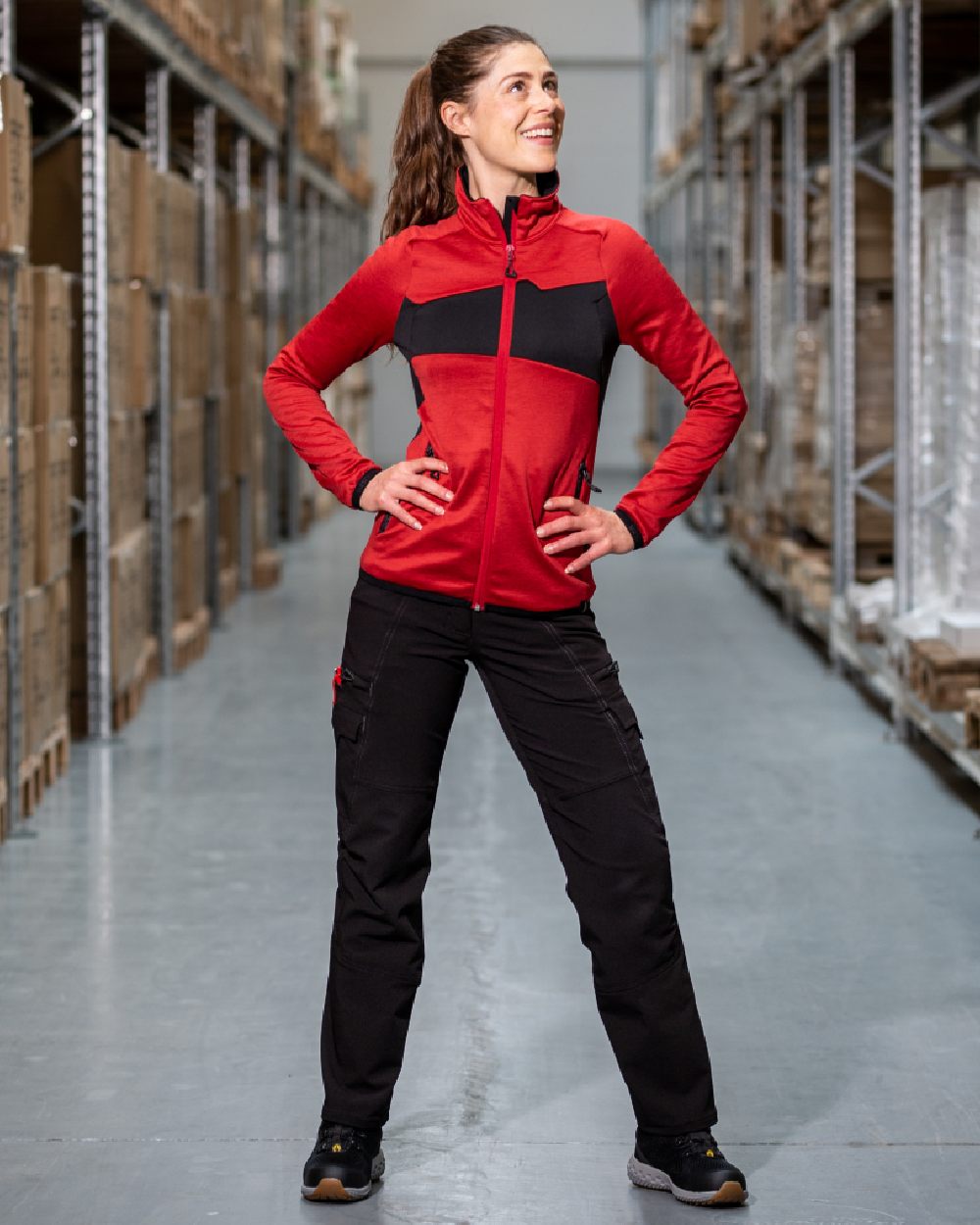 Black Coloured Mascot Workwear Womens Accelerate Trousers With Thigh Pockets on warehouse background