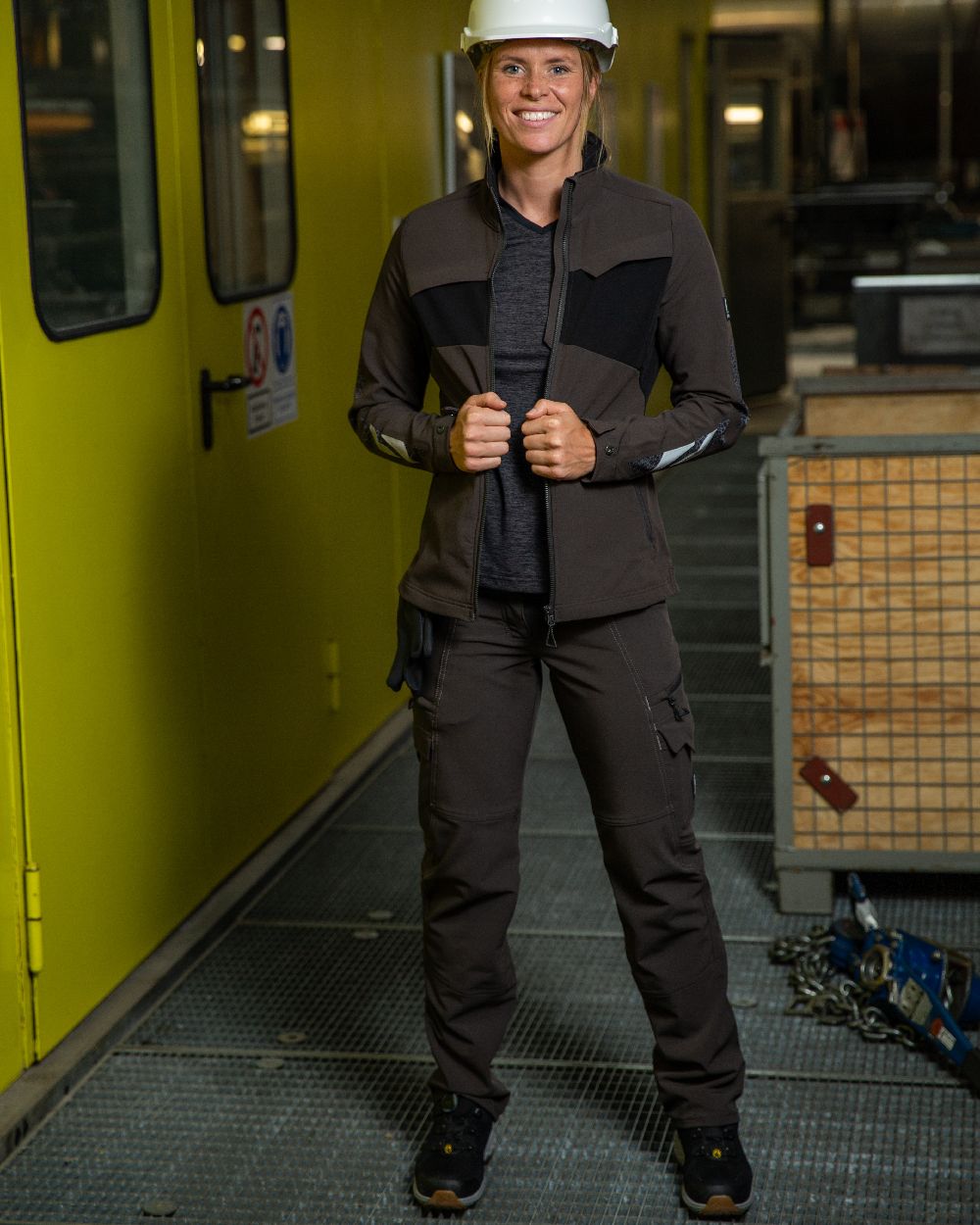 Dark Anthracite Coloured Mascot Workwear Womens Accelerate Ultimate Stretch Trousers on outdoor background