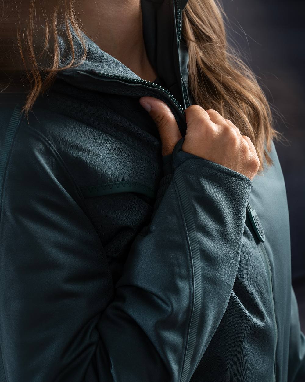Forest Green Coloured Mascot Workwear Womens Customized Waterproof Winter Jacket on studio background