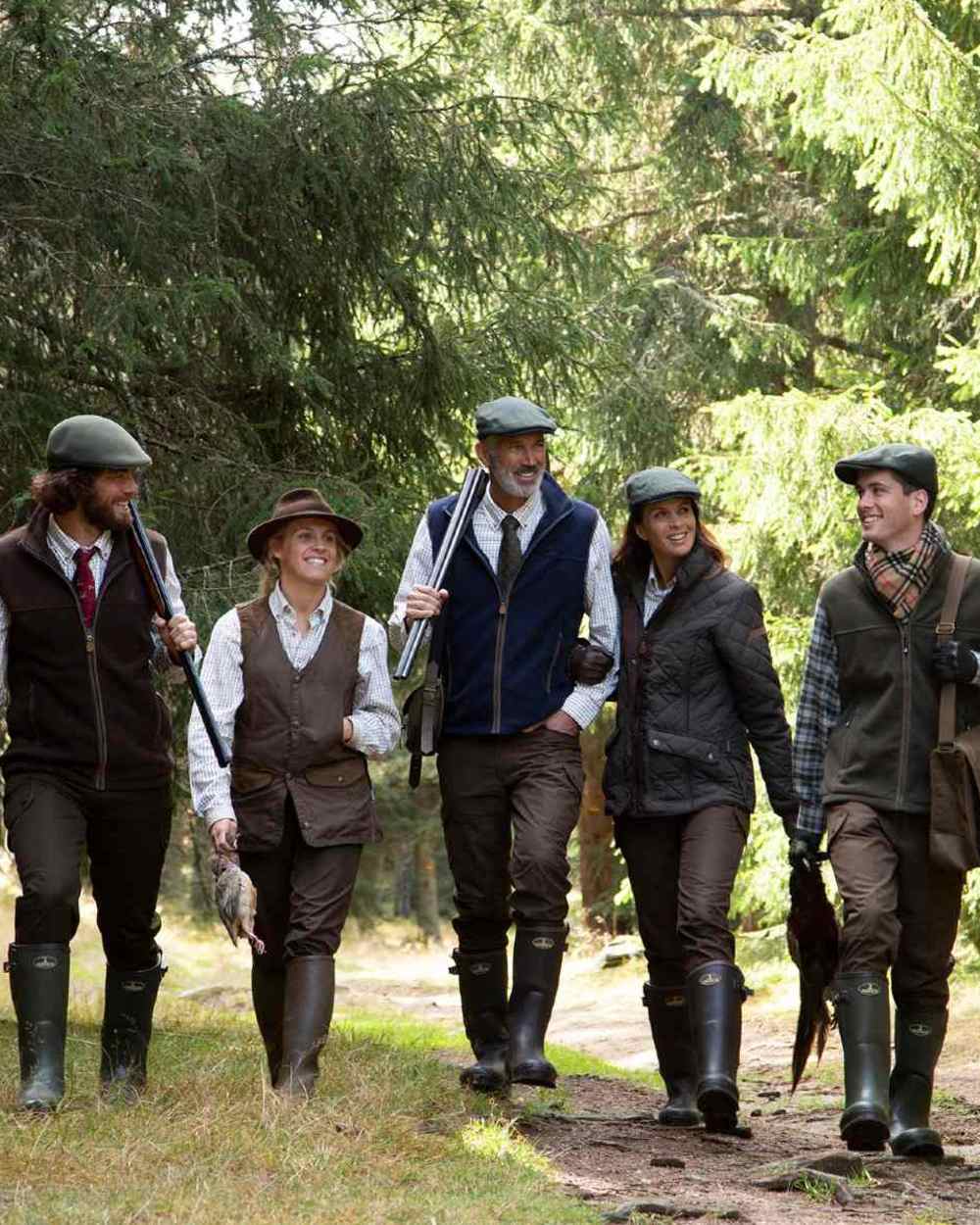 Navy coloured Percussion Scotland Fleece Gilet on forest background