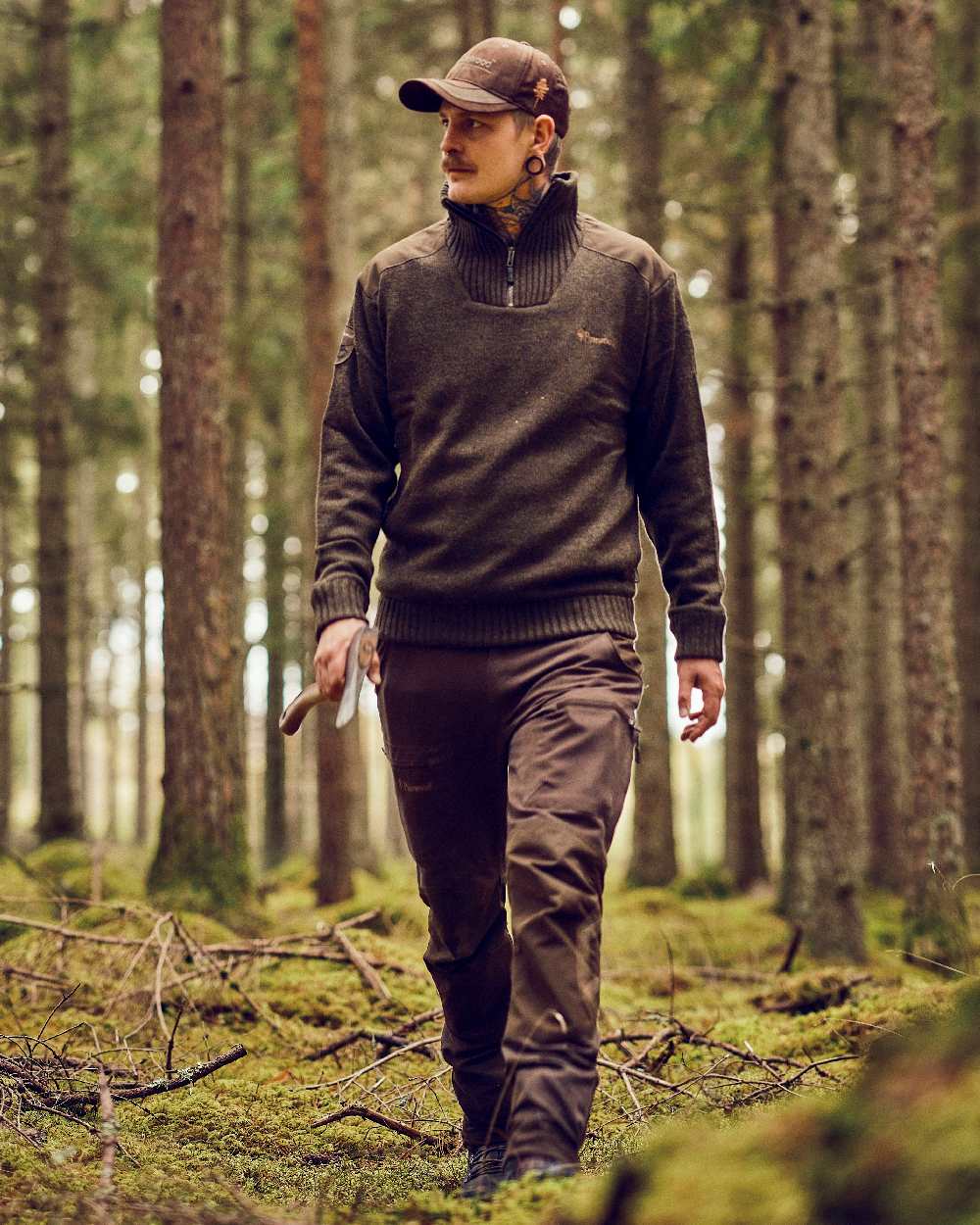 Dark Green Mel Coloured Pinewood Mens Hurricane Sweater on outdoor background