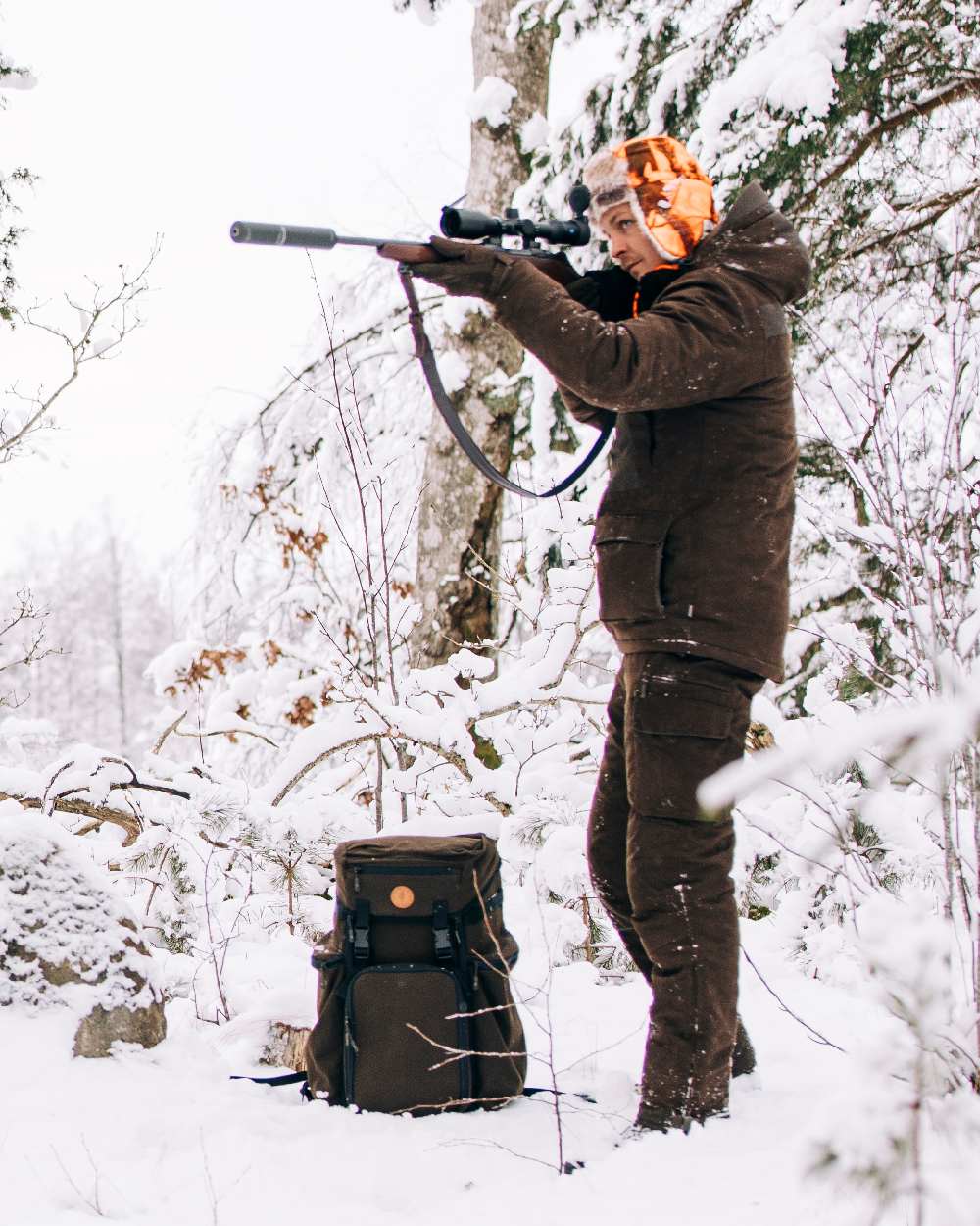Suede Brown Coloured Pinewood Mens Smaland Abisko 2.0 Hunting Jacket on snow background