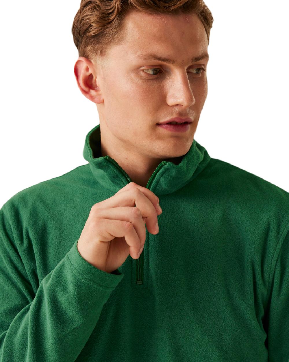 Bottle Green coloured Regatta Mens Micro Zip Neck Fleece on white background