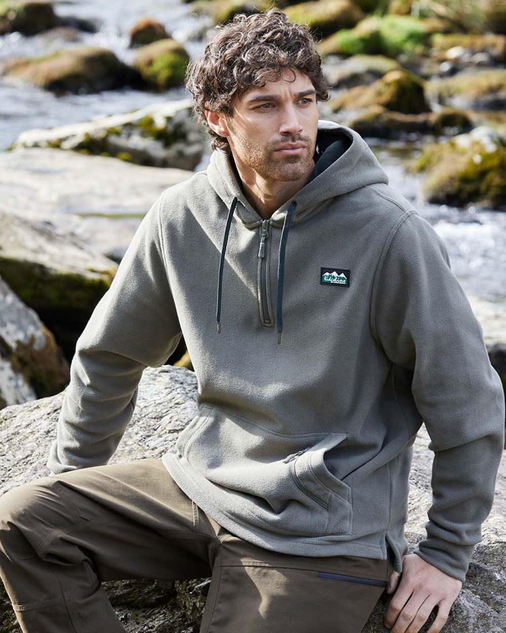 Smokey Olive Coloured Ridgeline Ballistic Hoodie On A lake Background