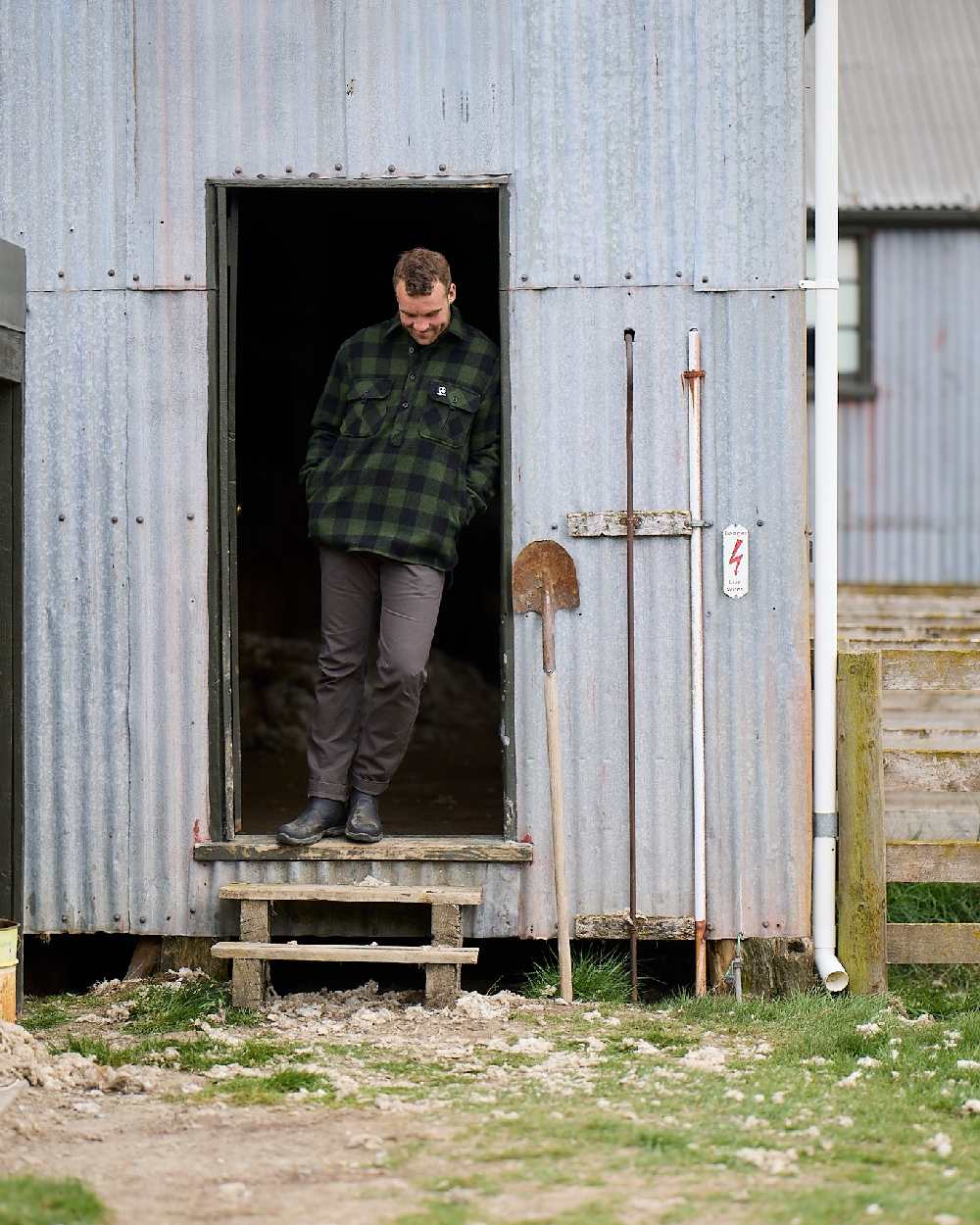 Charcoal Coloured Swanndri Mens Bedrock Canvas Work Pant on house background