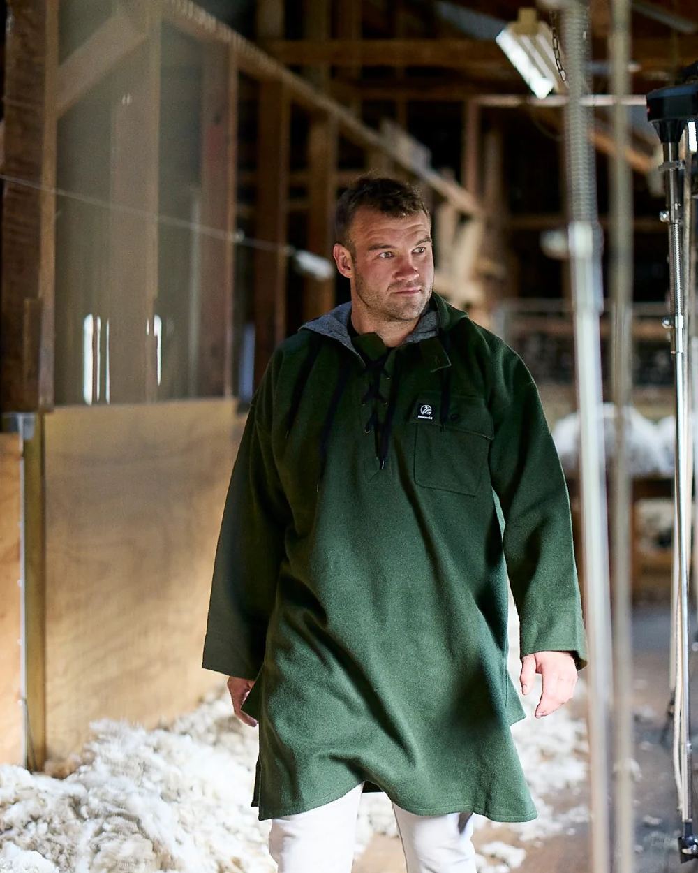 Olive Coloured Swanndri Mens Original Wool Bushshirt With Lace-Up Front on factory background