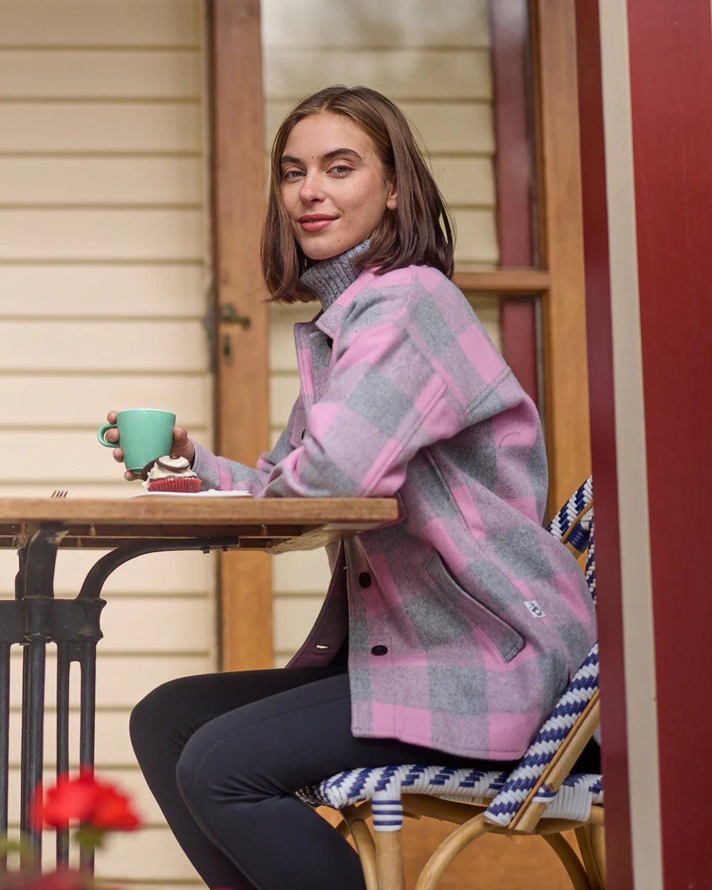 Rose Quartz Check Coloured Swanndri Womens Anchorage V2 Wool Shirt Jacket on restuarant background