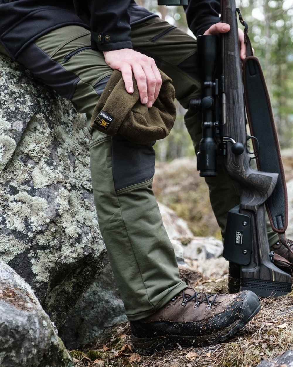 Gran Green coloured Swazi Mens Forest Pants on forest background