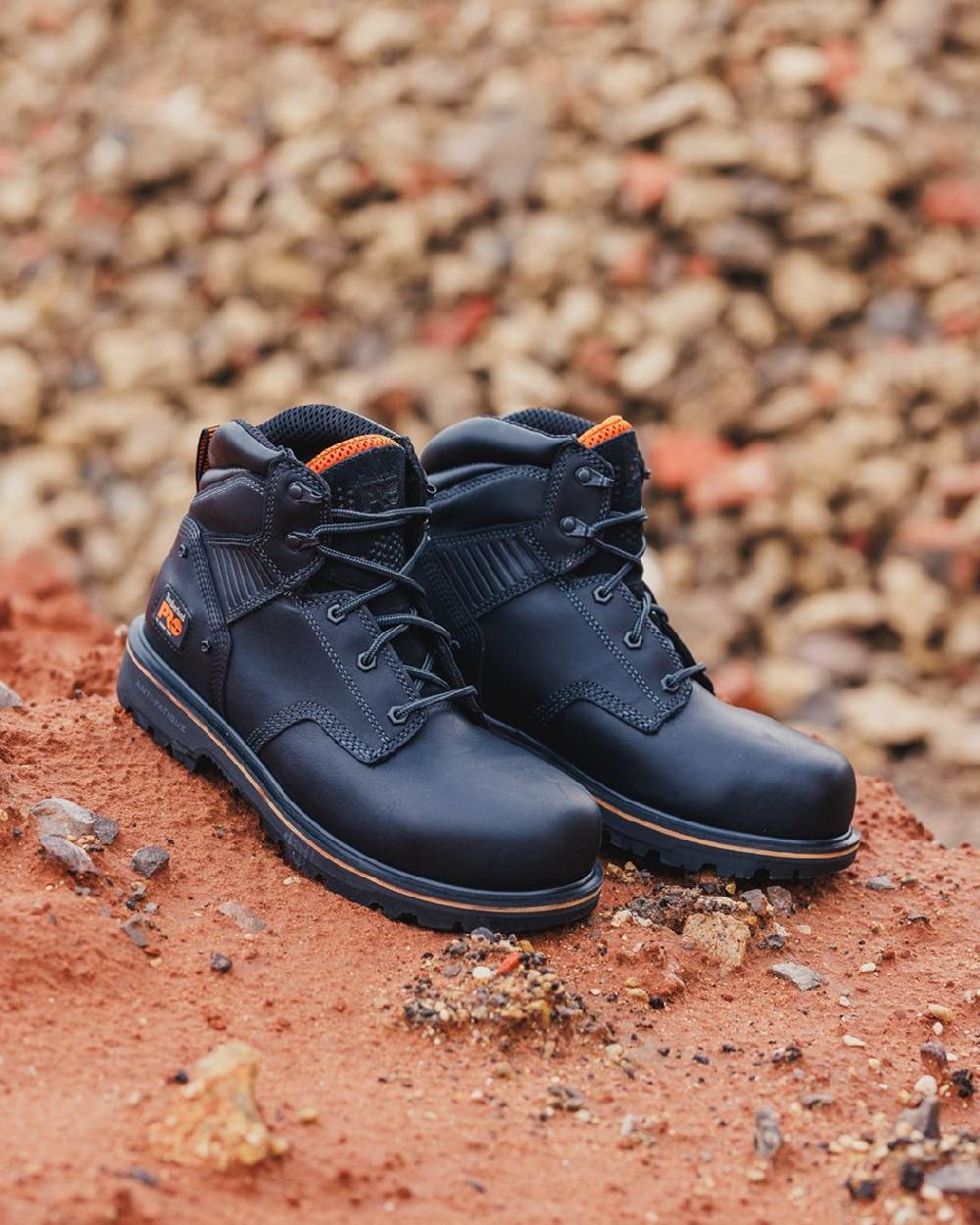 Black coloured Timberland Pro Ballast Safety Boots on blurry background