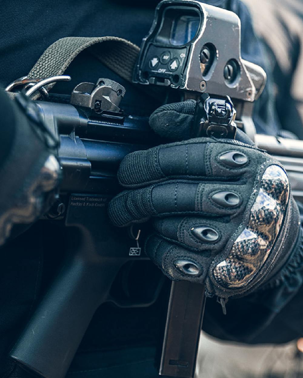 Black Coloured Viper Elite Gloves on blurry background