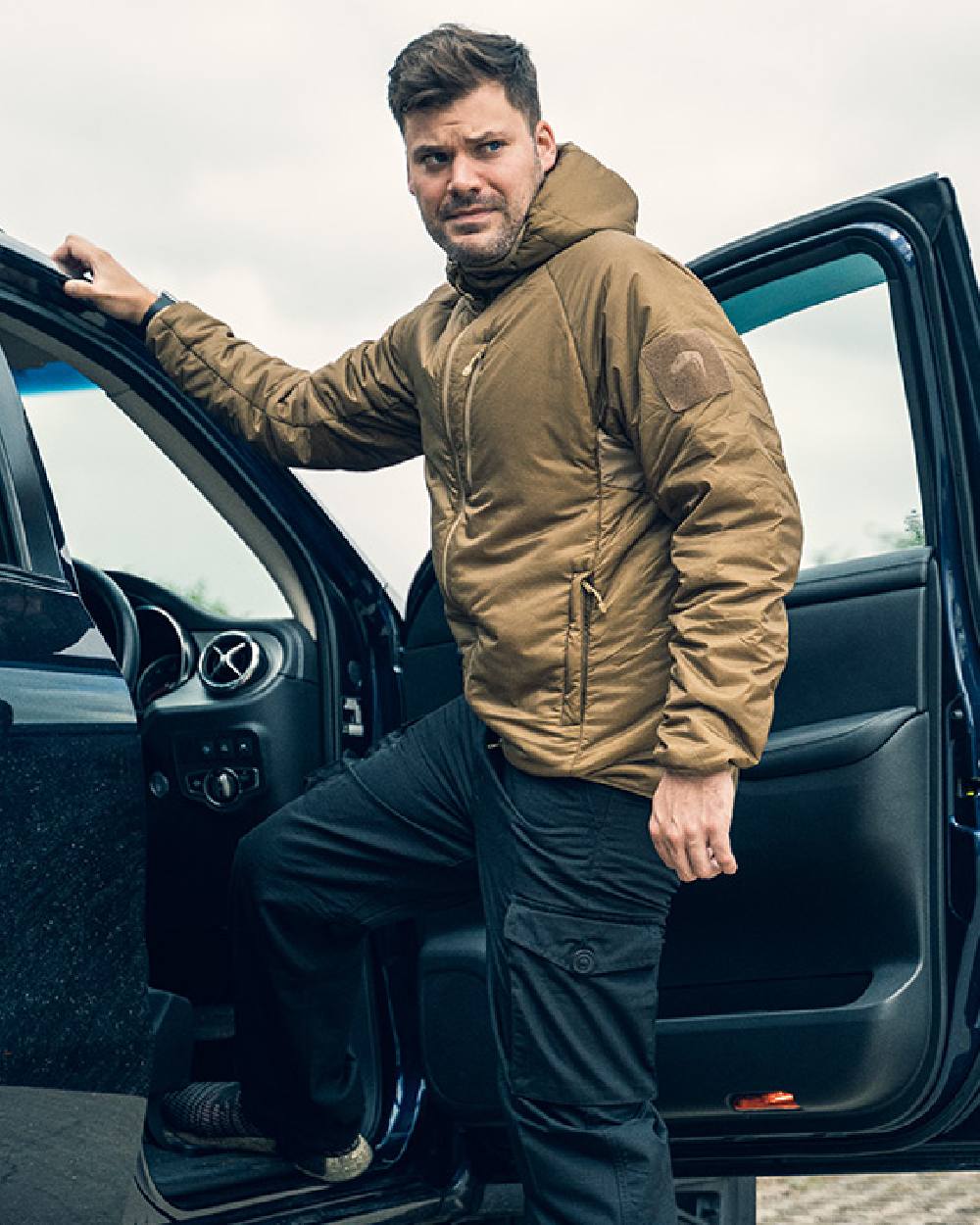 Dark Coyote Coloured Viper Frontier Jacket on car background