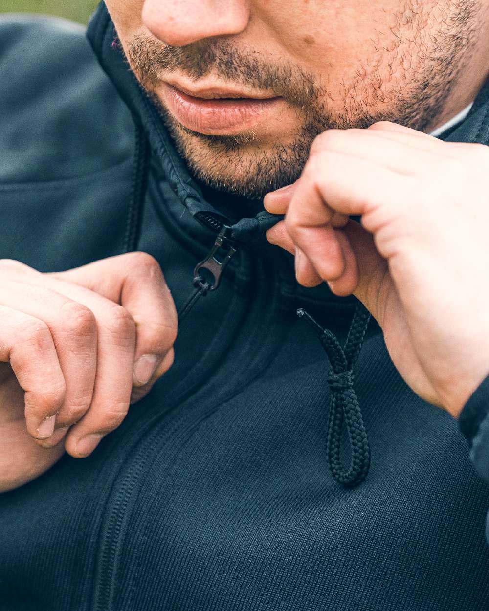 Black coloured Viper Storm Hoodie on blurry background