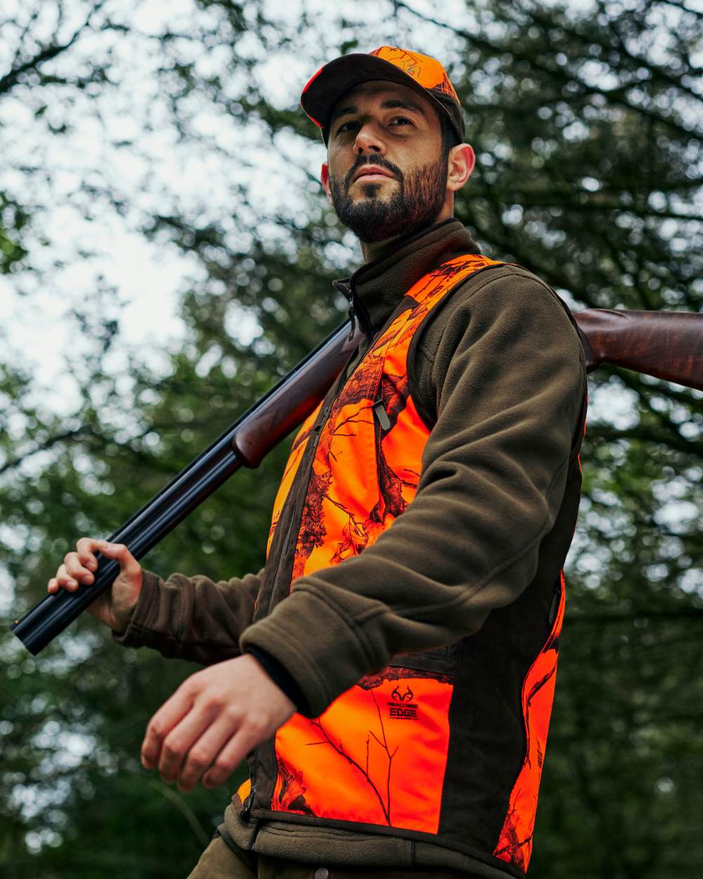 Tarmac Green Coloured Deerhunter Eagle Fleece Jacket On A Forest Background