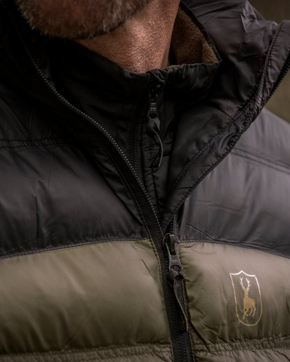 Rifle Green coloured Deerhunter Northward Padded Waistcoat on Forest background