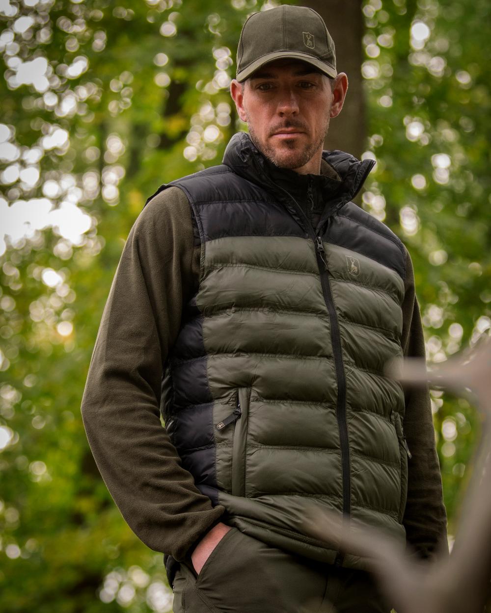 Rifle Green coloured Deerhunter Northward Padded Waistcoat on Forest background