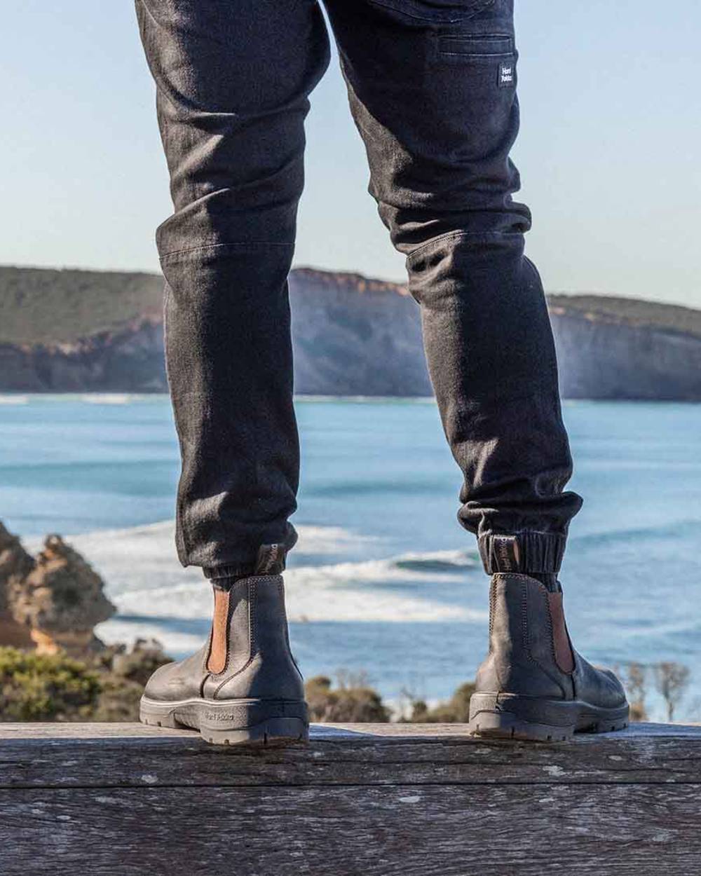 Brown Coloured Hard Yakka Brumby Non-Safety Dealer Boots on Outdoor Background