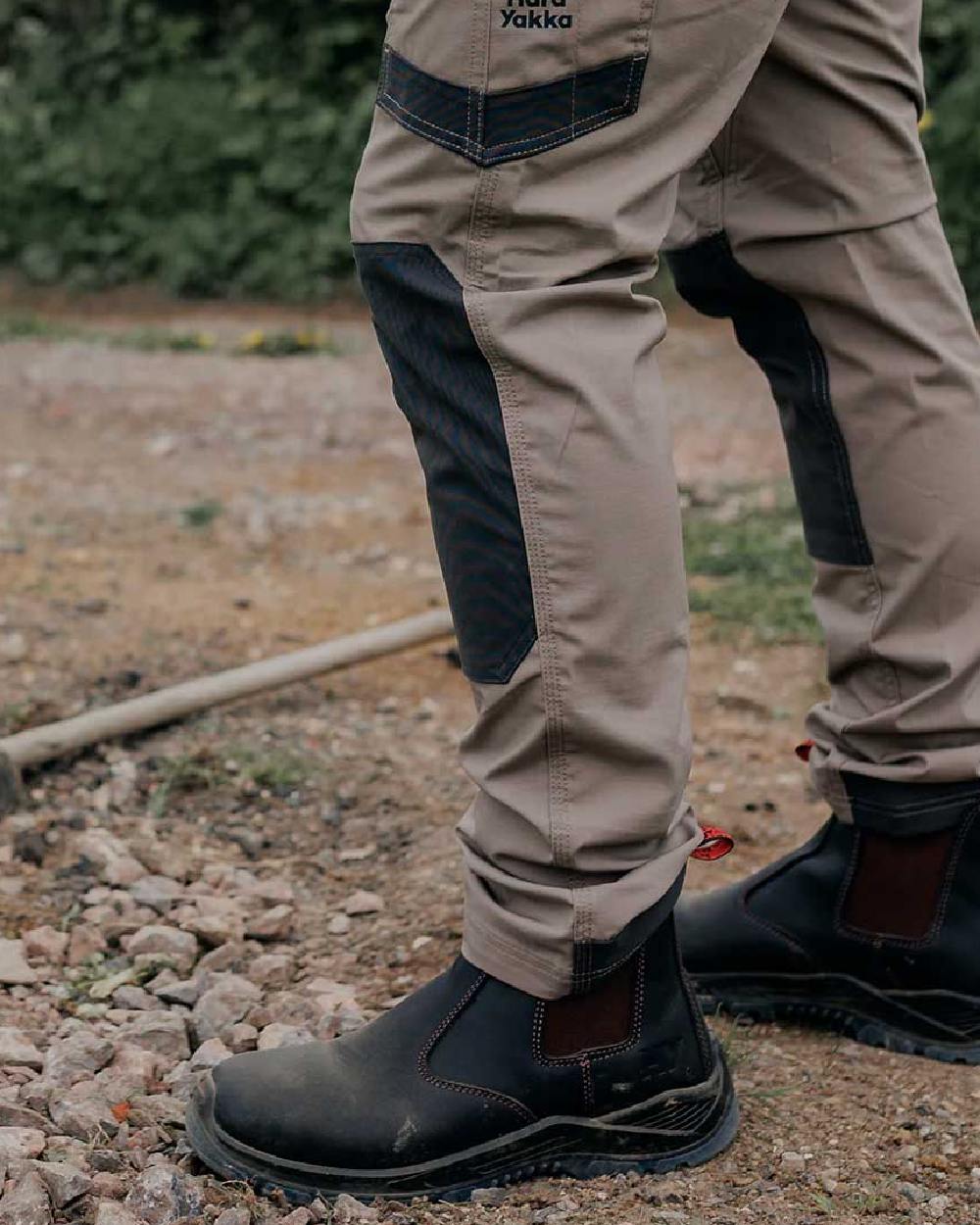 Brown Coloured Hard Yakka Mens Banjo Non Safety Elastic Gusset Boots on Outdoor Background