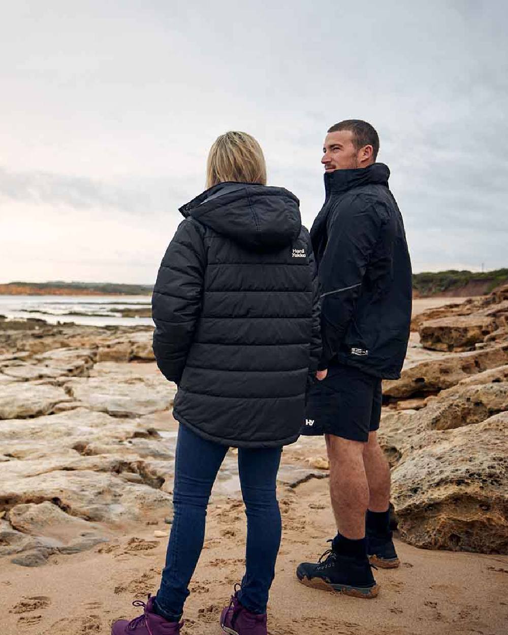 Black Coloured Hard Yakka Mens Orbit Waterproof Jacket on Outdoor Background