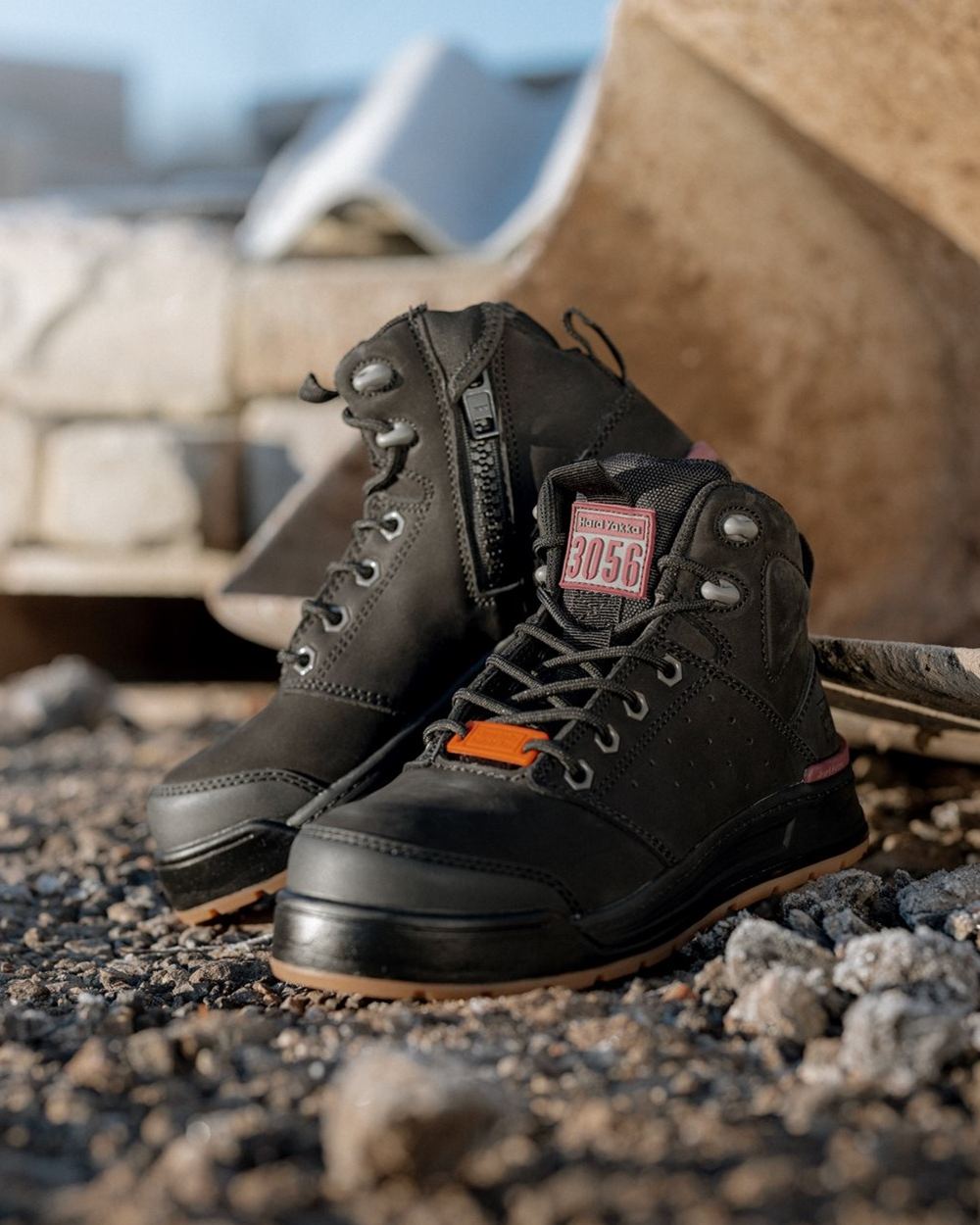 Black Coloured Hard Yakka Womens 3056 PR Side Zip Safety Boots on Outdoor Background
