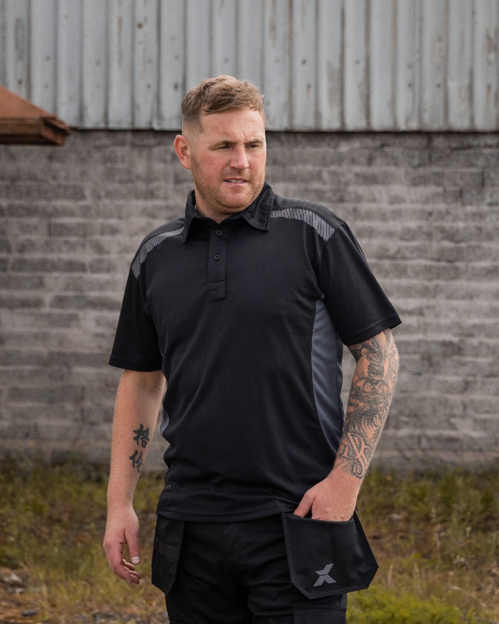 Black Grey Coloured Xpert Mens Pro Stretch Polo Shirt on Outdoor Background