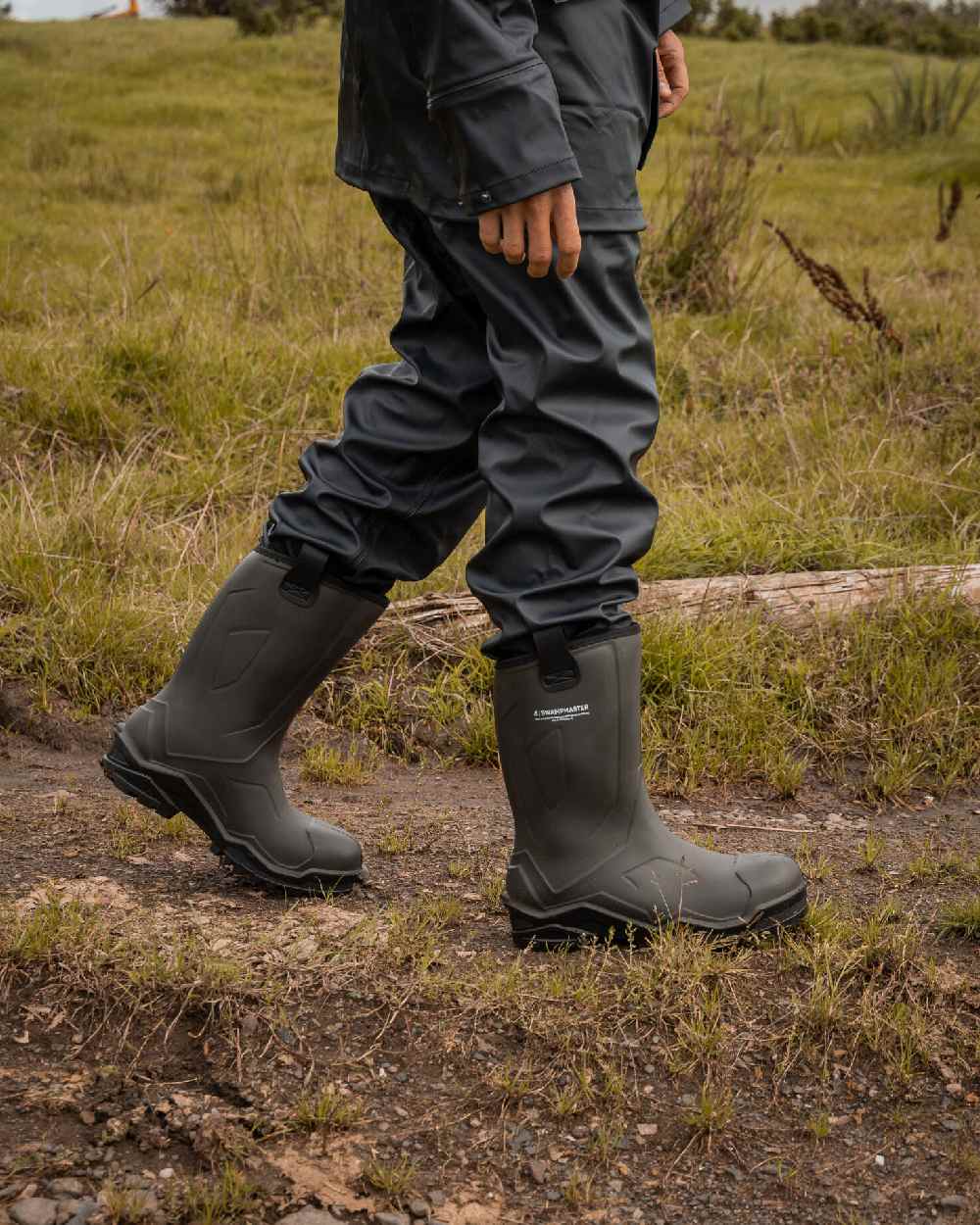 Green Coloured Xpert Mens Swampmaster Pro Challenger+ Safety Wellingtons on Outdoor Background