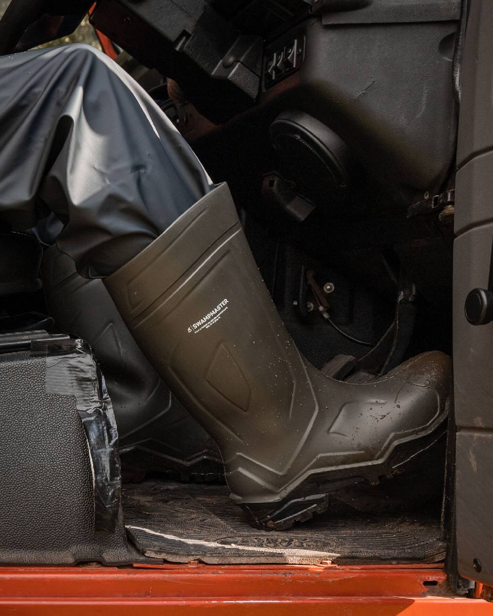Green Coloured Xpert Mens Swampmaster Pro Defender+ S5 Safety Wellingtons on Car Background