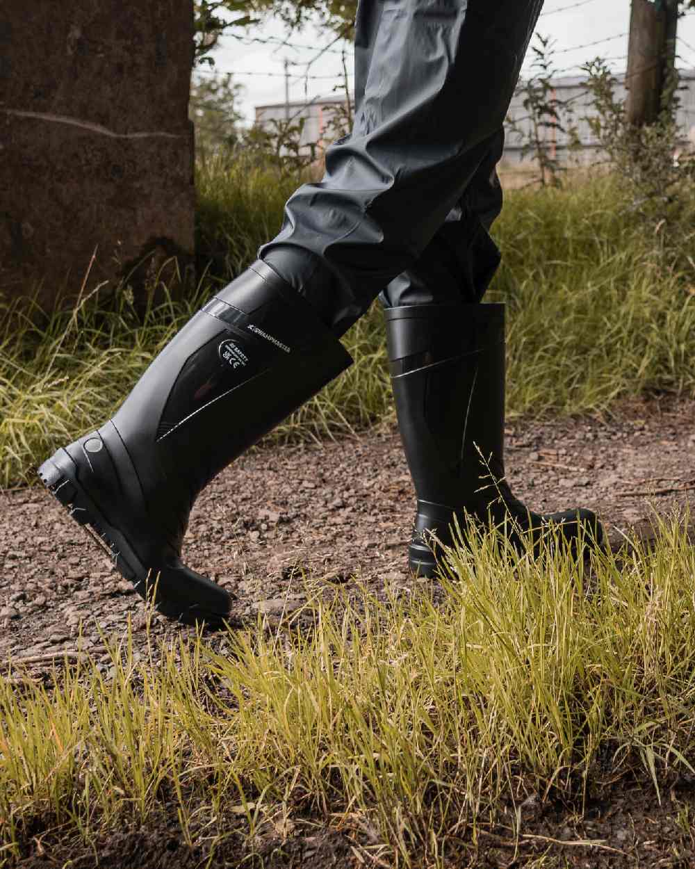 Black Coloured Xpert Mens Swampmaster Titan S5 Safety PVC Wellingtons on Outdoor Background