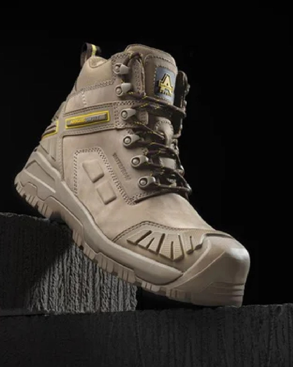 Stone coloured Amblers Safety AS965C Stone Safety Boots on black background 