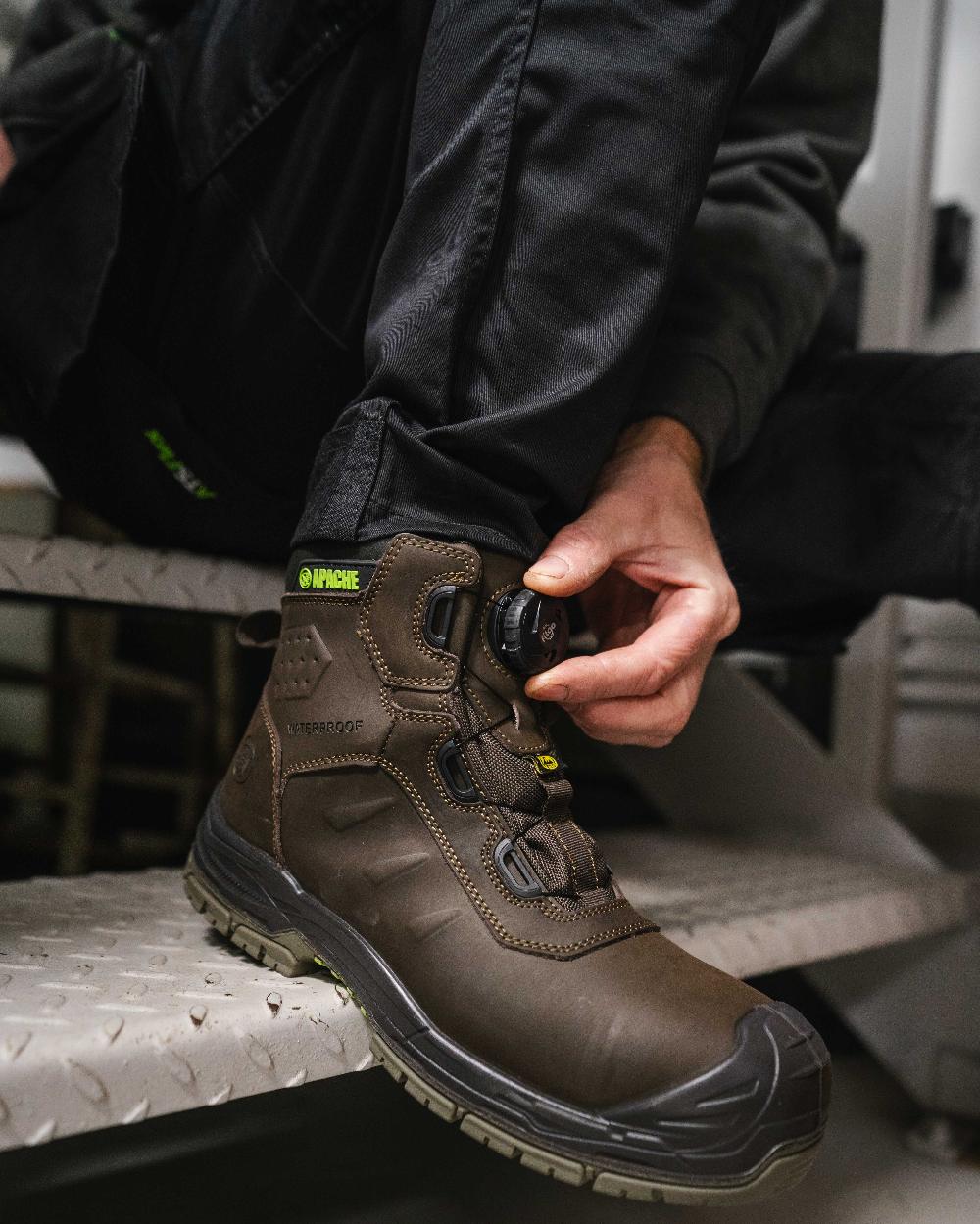 Brown Coloured Apache Mens Churchill Waterproof FITGO Safety Boots ESD on outdoor background 