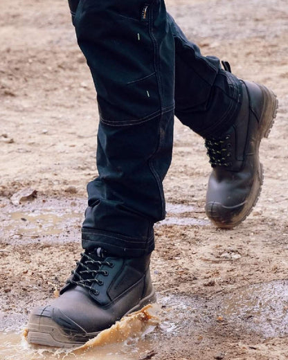 Black Coloured Apache Mens Cranbrook Waterproof ESD Safety Boots on outdoor background 