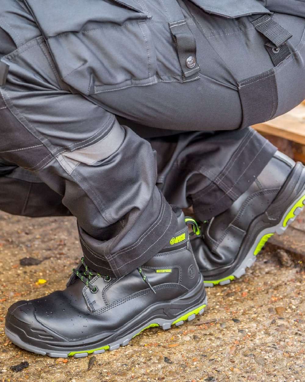 Black Coloured Apache Mens Dakota Metal Free Waterproof Safety Boots on white background 