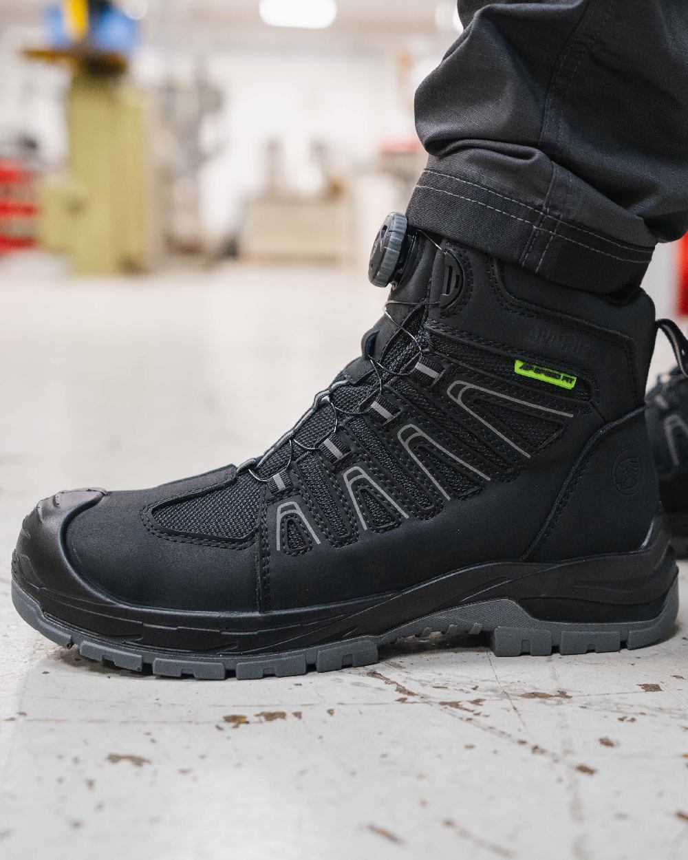 Black Coloured Apache Mens Fort Fitgo GRS Recycled Leather Waterproof Safety Boots ESD on outdoor background 