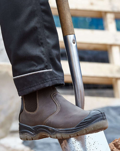 Brown Coloured Apache Mens Water Resistant Safety Dealer Boots on outdoor background 