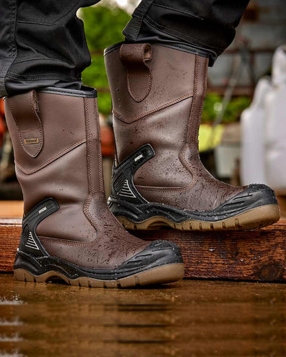 Brown Coloured Apache Mens Waterproof Rigger Boots on outdoor background 