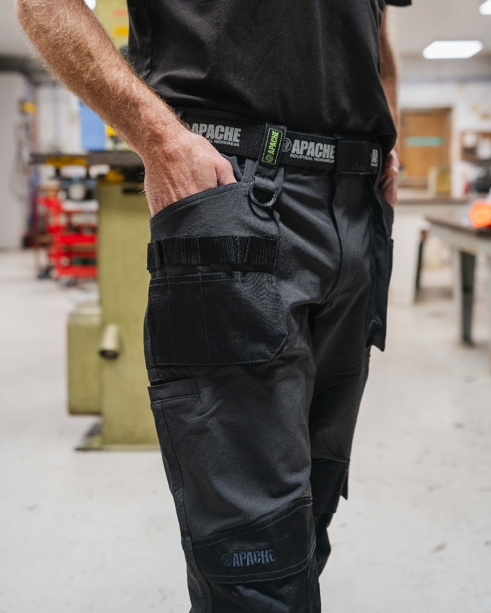 Grey Black Coloured Apache Mens Yellowknife Elasticated Hem 4 Way Stretch Trousers on office background 
