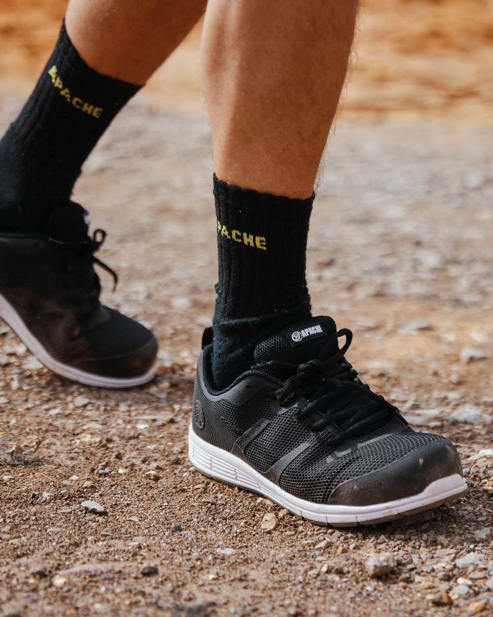 Black Coloured Apache Vault Lightweight Sports Trainer Shoes on outdoor background 