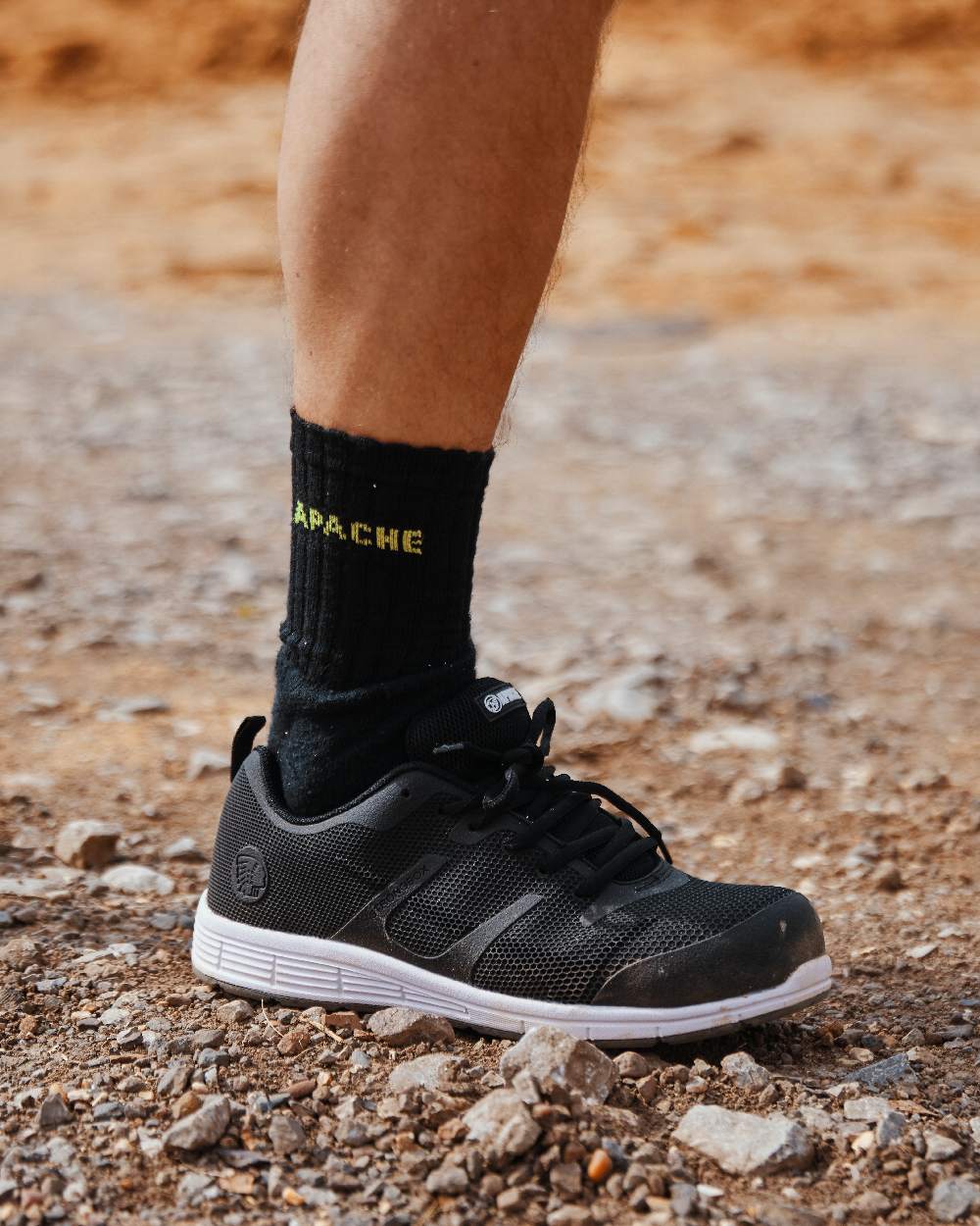Black Coloured Apache Vault Lightweight Sports Trainer Shoes on outdoor background 