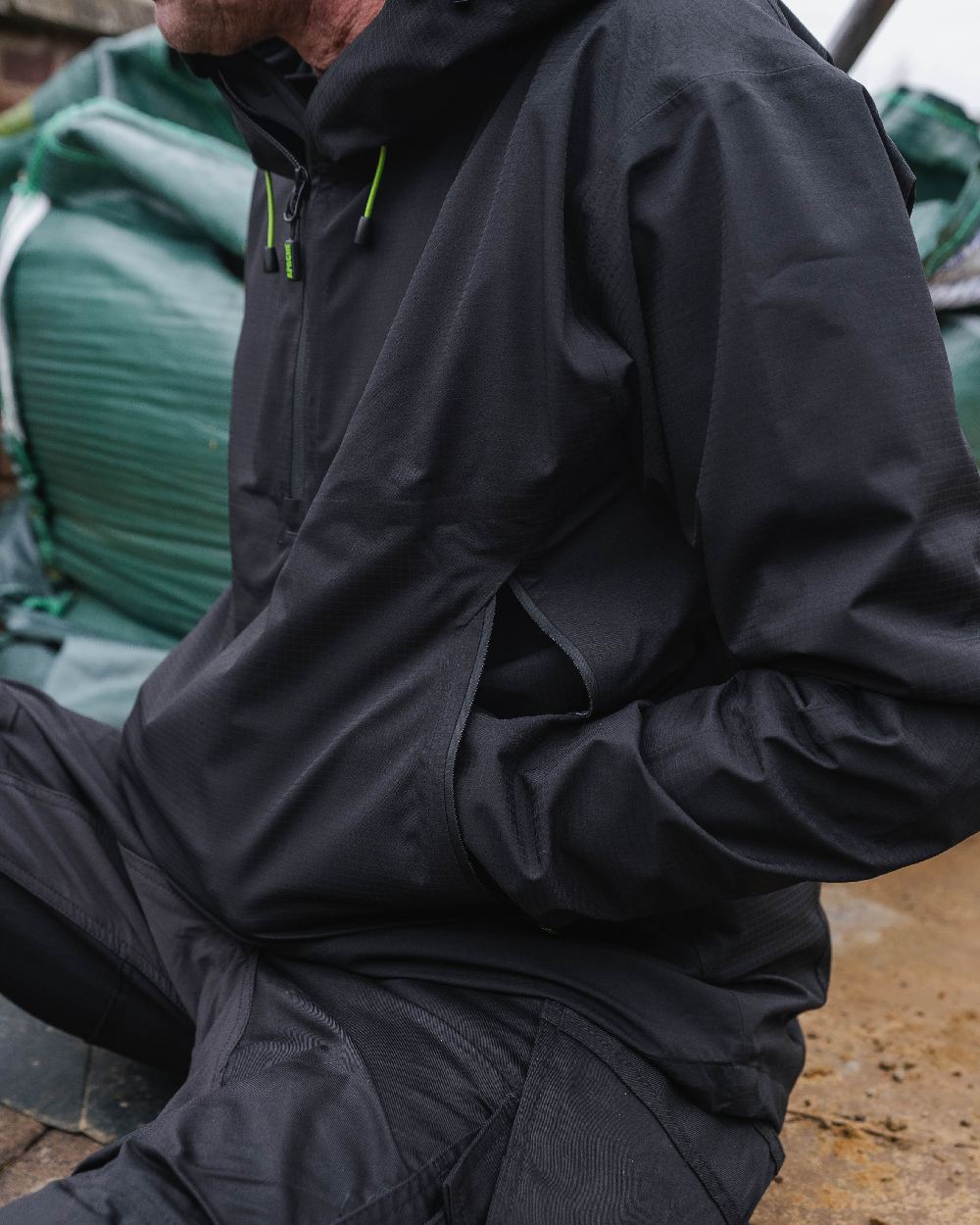 Black Coloured Apache Mens White Rock Rain Jacket on outdoor background 