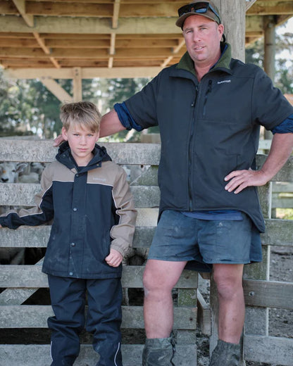 Black coloured Betacraft Childrens ISOJNR Bib Overtrousers on outdoor background 