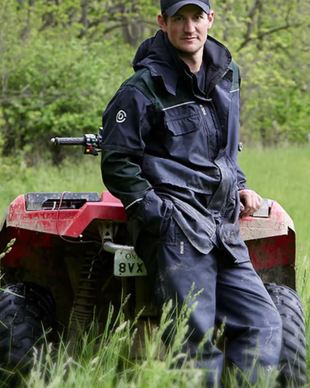 Black Moss coloured Betacraft ISO940 Eco Bib Overtrousers on forest background 