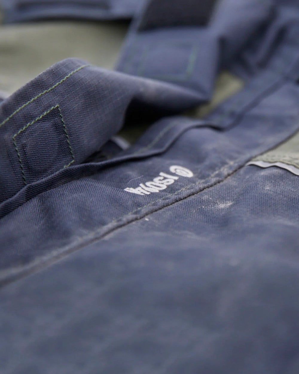 Black Moss coloured Betacraft ISO940 Eco Elite Parka on outdoor background 