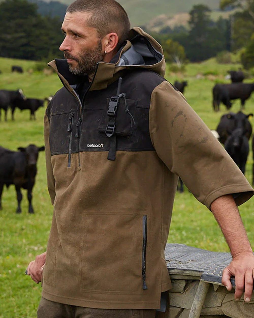 Taupe coloured Betacraft Mamaku Smock on mountain background 