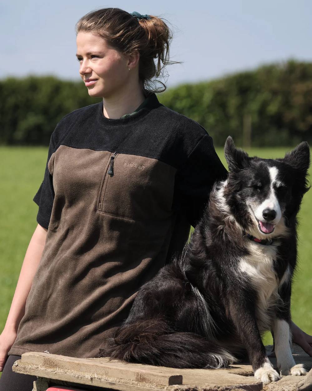 Olive coloured Betacraft Quest ECO Fleece T-Shirt on grass background 