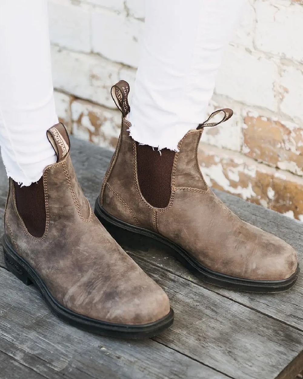 Rustic Brown coloured Blundstone 1306 Rustic Brown Chelsea Boots on wall background 