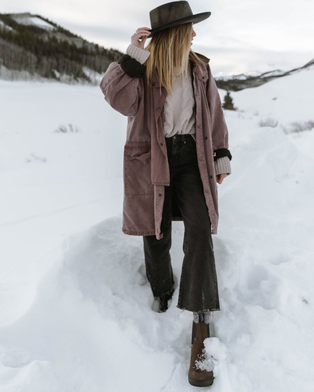 Antique Brown coloured Blundstone 1477 Antique Brown Waterproof Boots on snow background 